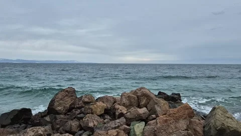 Big splash on the rocks Stock Footage 300308871