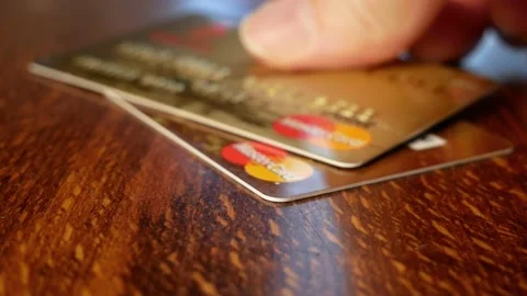 Big stack of bank credit cards and car model, car loan, insurance concept Stock Footage 232610438