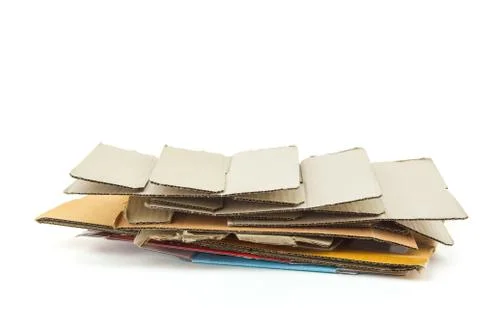 Big stack of cardboard isolated on white background - recycle concept. Foto stock