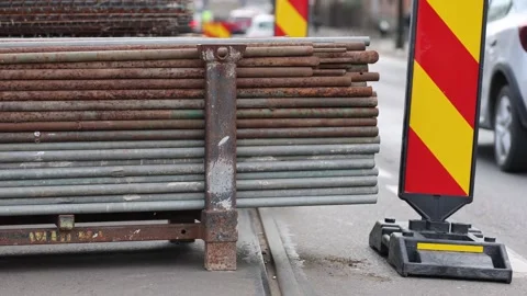 Big stack of iron bars used in road construction and tram rail reconstruction 스톡 동영상 267266079