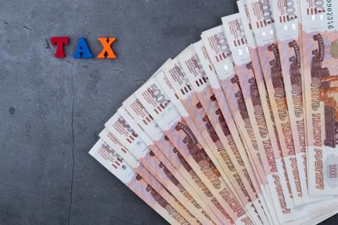 Big stack of Russian money banknotes of five thousand rubles lying fan on a g Stock Photos