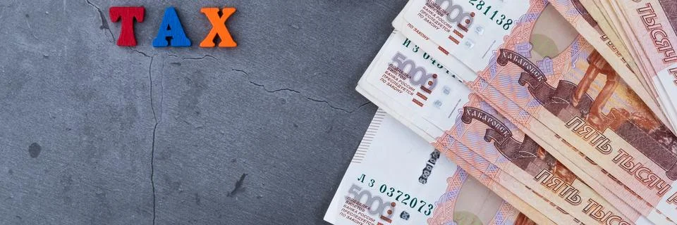 Big stack of Russian money banknotes of five thousand rubles lying fan on a g Stock Photos