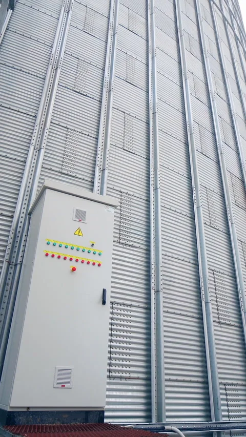 Big stainless elevator industrial tanks. Huge food industry steel storehouse. Stock Footage 317938647