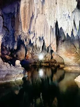 Big stalactite in a cave, Thakhek loop, Laos Stock Photos