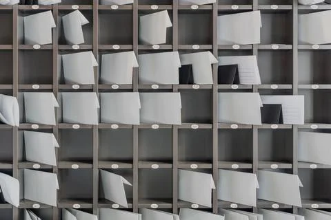 Big stand with numbered sections with correspondence 스톡 사진