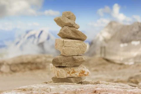 Big stone tower in mountains height show balance stability power. Stones stac Foto stock