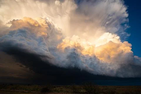 Big Storm Clouds Build Up Into The Sky As The Sun Sets Fotos Stock