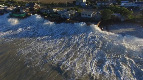 Big storm driven waves crash into coastal properties Stock Footage 95061387