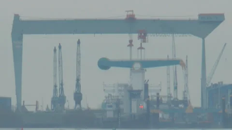 Big strange crane in the other side of the river Elbe Video stock 33764196