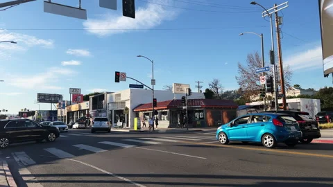 Big street intersection on melrose ave in the sun with blue sky  Stock Footage 169343850