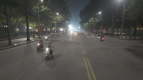 Big streets low angle drone fly follow night hanoi Vidéo 287083393