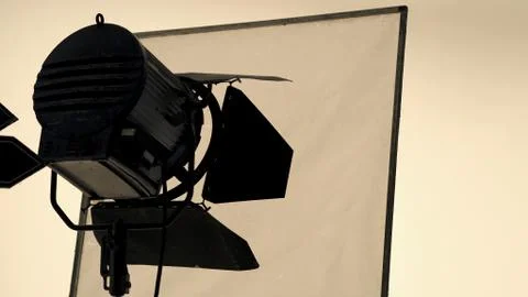 Big studio flash light on tripod and soft box Stock Photos