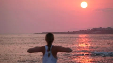 Big sun. Blurred defocus silhouette of girl on background of dawn or sunset. Stock Footage 134826073