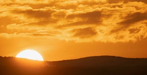 Big sun close-up rising in mountain Видео 120403716