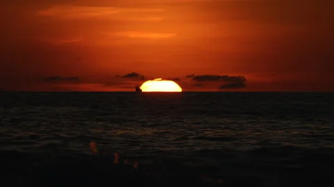 Big sun down to ocean 2021 Stock Footage 155727851