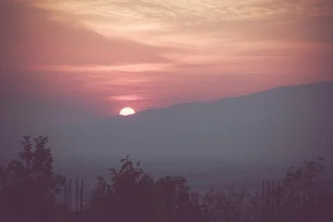 Big sun on the mountain Stock Photos