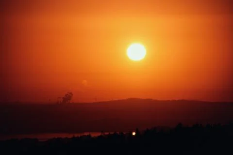 Big sun on the mountain Stock Photos