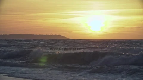 Big sun raise over sea red sky with big waves Stock Footage 140301547
