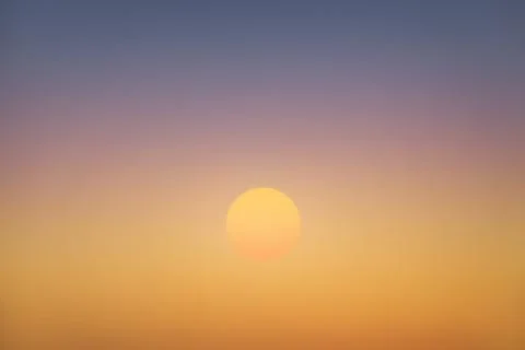 Big sun on sky at sunset Stock Photos