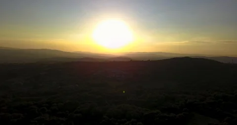 BIG SUN IN THE SUNSET AERIAL VIEW Stock Footage 95038540