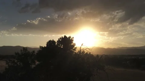 Big Sun at sunset- Drone camera moves back and down Stock Footage 134815078