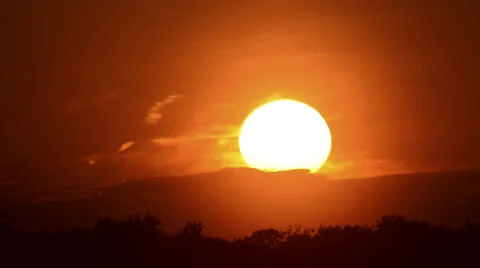 Big sun sunset time lapse with clouds over trees close HD 1080 version Stock Footage 24743847