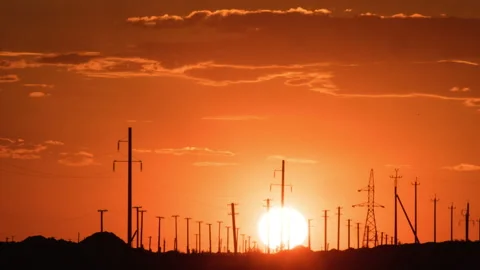 Big sun sunset time lapse, majestic clean Big Red Hot Sun in Warm Air Distortion Stock Footage 224302394