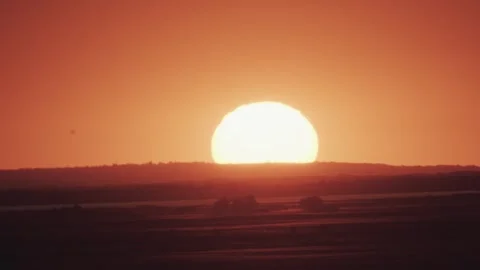 Big sun at sunset without clouds Stock Footage 243133216