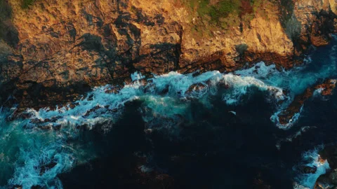 Big Sur, CA Ocean Waves Crashing into Rocky Cliffside - Drone Aerial  Overhead Stockbeeldmateriaal 280097573