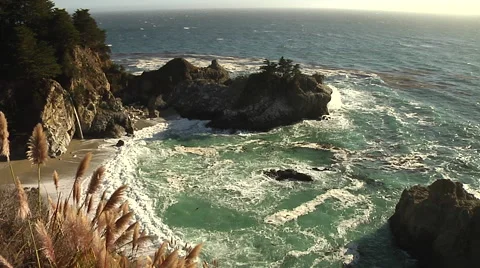 Big Sur Ocean waves and Beach with Waterfall Stock Footage 41380625