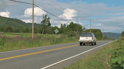 Big SUV and Small Car on Rural Highway Video stock 8601591