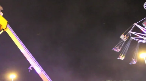 Big Swing Carnival Fair Ground Rides Night Lights Screams Stock Footage 35650532