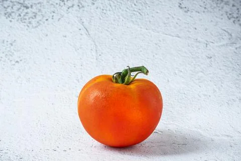 Big tomato with white background Stock Photos