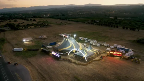 Big top of a circus with caravans in a field Stock Footage 203499074