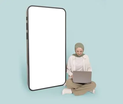 Big touch screen smartphone mock up  muslim woman sit near Stock Photos
