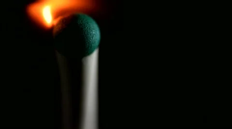 Big Tourist Match burning.  Macro shot on black background. Slow motion Stock Footage 61565892
