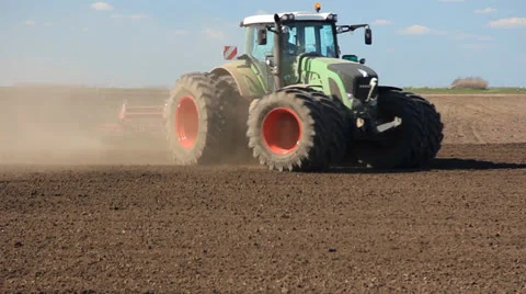 Big tractor preparing field for sowing Stock Footage 22642673