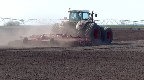 Big tractor preparing field for sowing Stock Footage 23305288