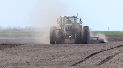 Big tractor preparing field for sowing Stock Footage 23305327