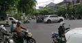Big traffic at main road crossing with lot of vehicles and motorbikes in Bali 4k or 4k+ Resolution