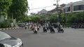 Big traffic at main road crossing with lot of vehicles and motorbikes in Bali 4k or 4k+ Resolution