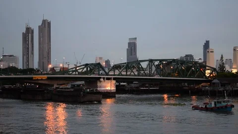 Big Transporter Ship Passes Gets Pulled Through a Bridge at Sunset Video stock 90161679