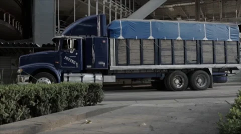 Big truck moving in reverse in Mexico city  Stock Footage 45154898