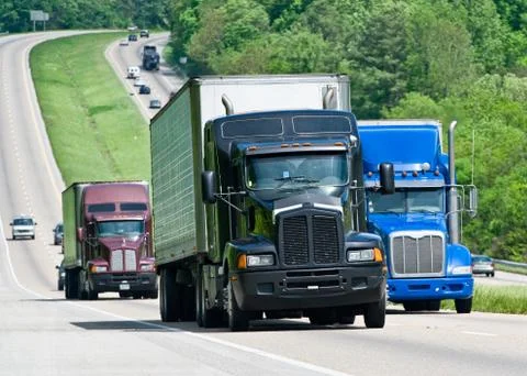 Big Trucks On The Interstate Highway Stock Photos