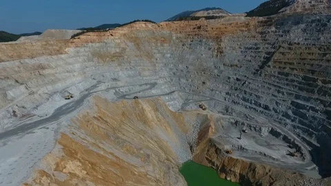 Big trucks work in a career Video stock 84035361