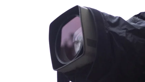 Big TV camera in a waterproof case at work Stock Footage 79339514