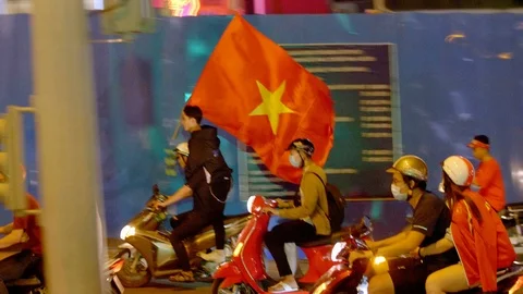 Big Vietnamese flag celebrating on the street Stock Footage