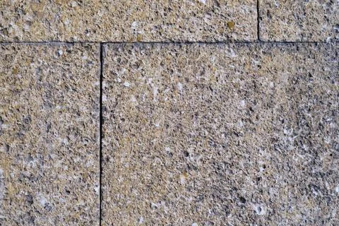Big wall facing tile made of gray stone, texture, outdoor. 写真素材