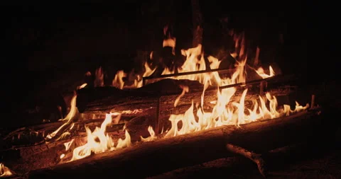 Big warm cinematic campfire in the forest. Warming fire background for Stock Footage 131865378