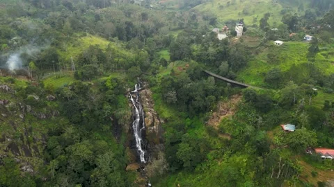 Big waterfall at tea plantations and a train line bridge in Ella - Sri Stock Footage 234606769